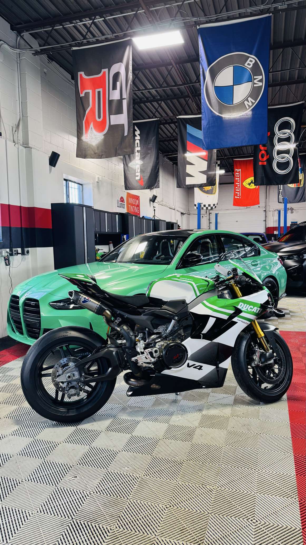 Ducati V4 and green BMW M4 at Detail Masters