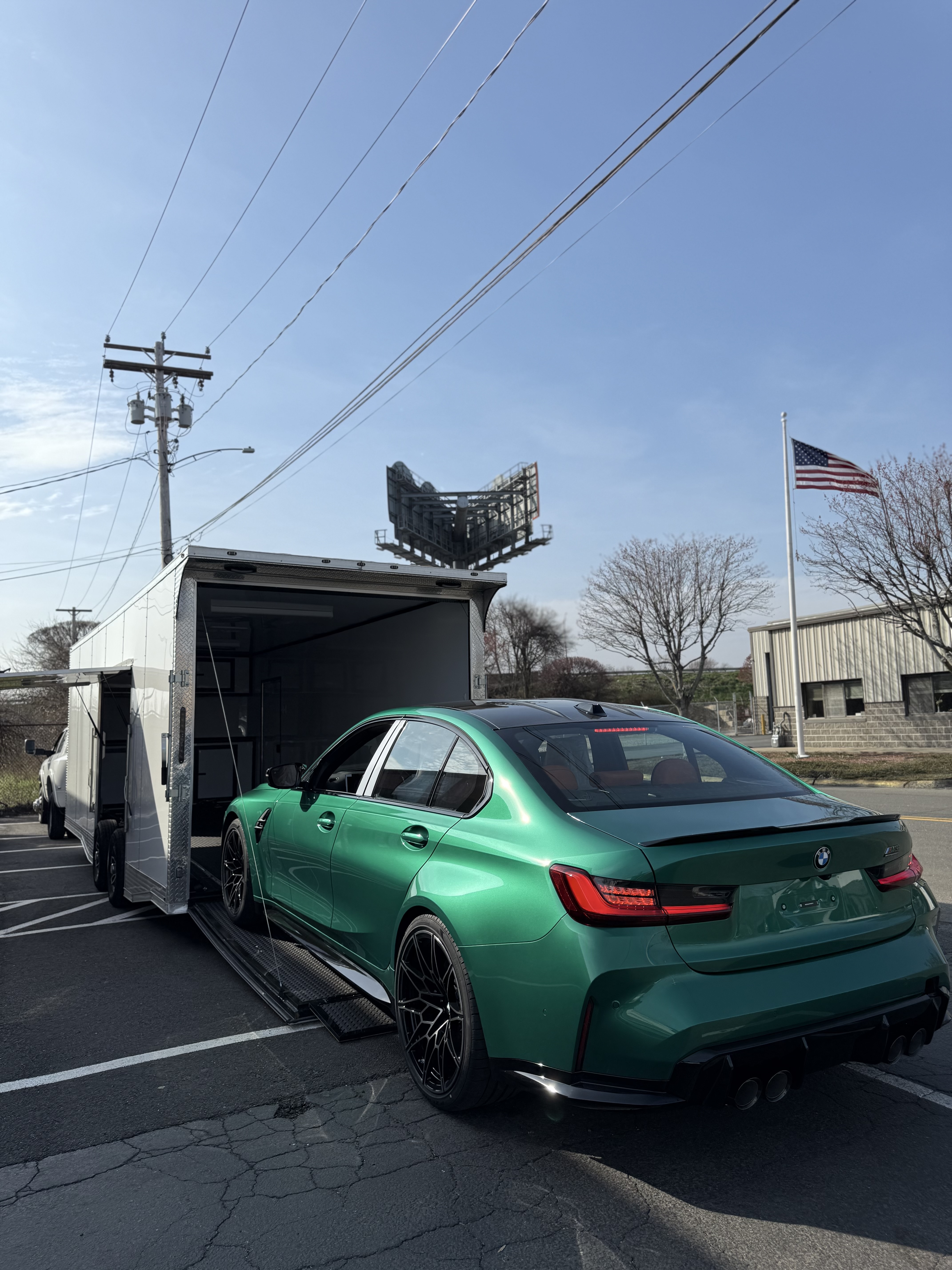 Green BMW M3 enclosed transport