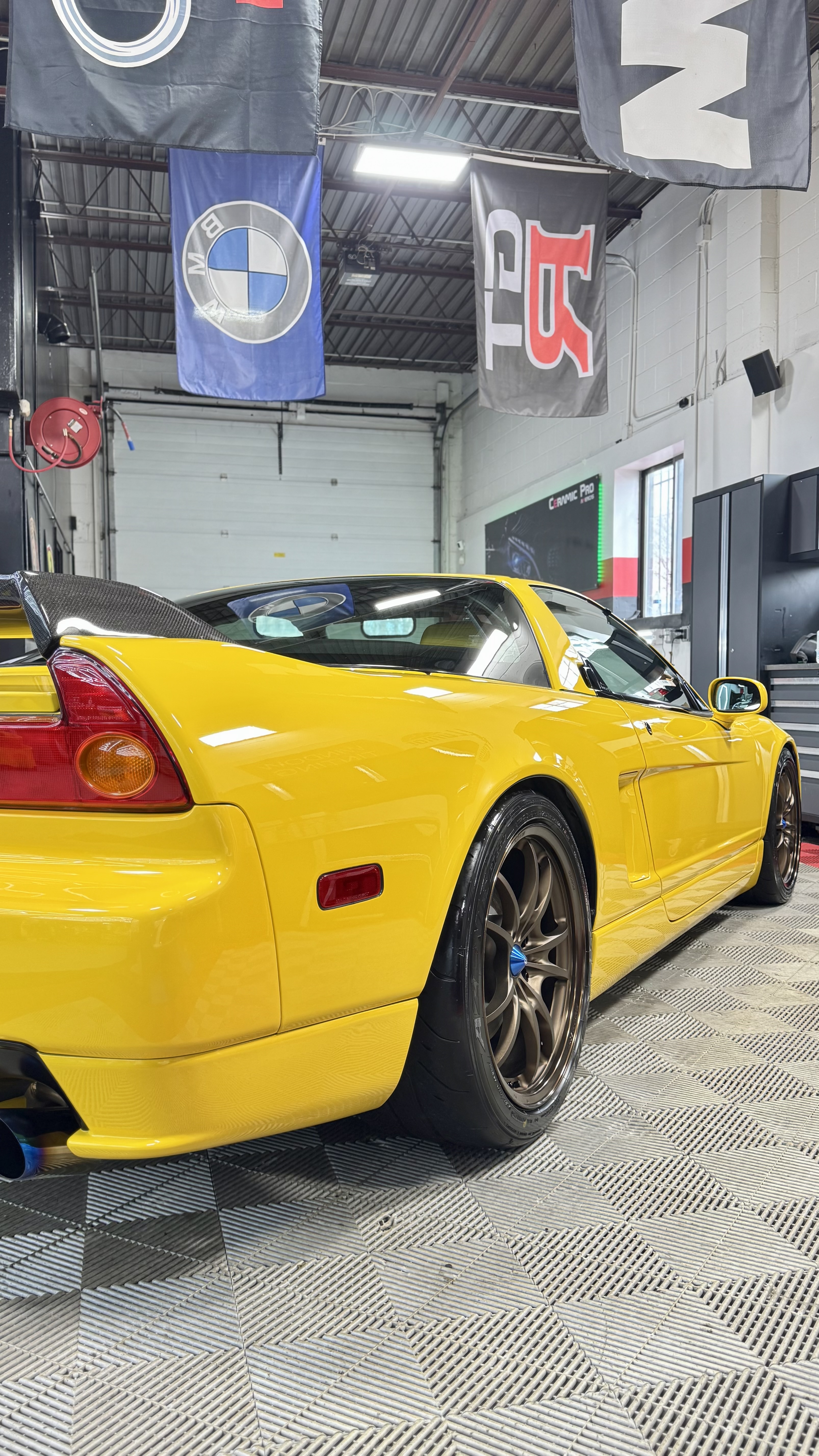 Yellow Acura NSX rear view