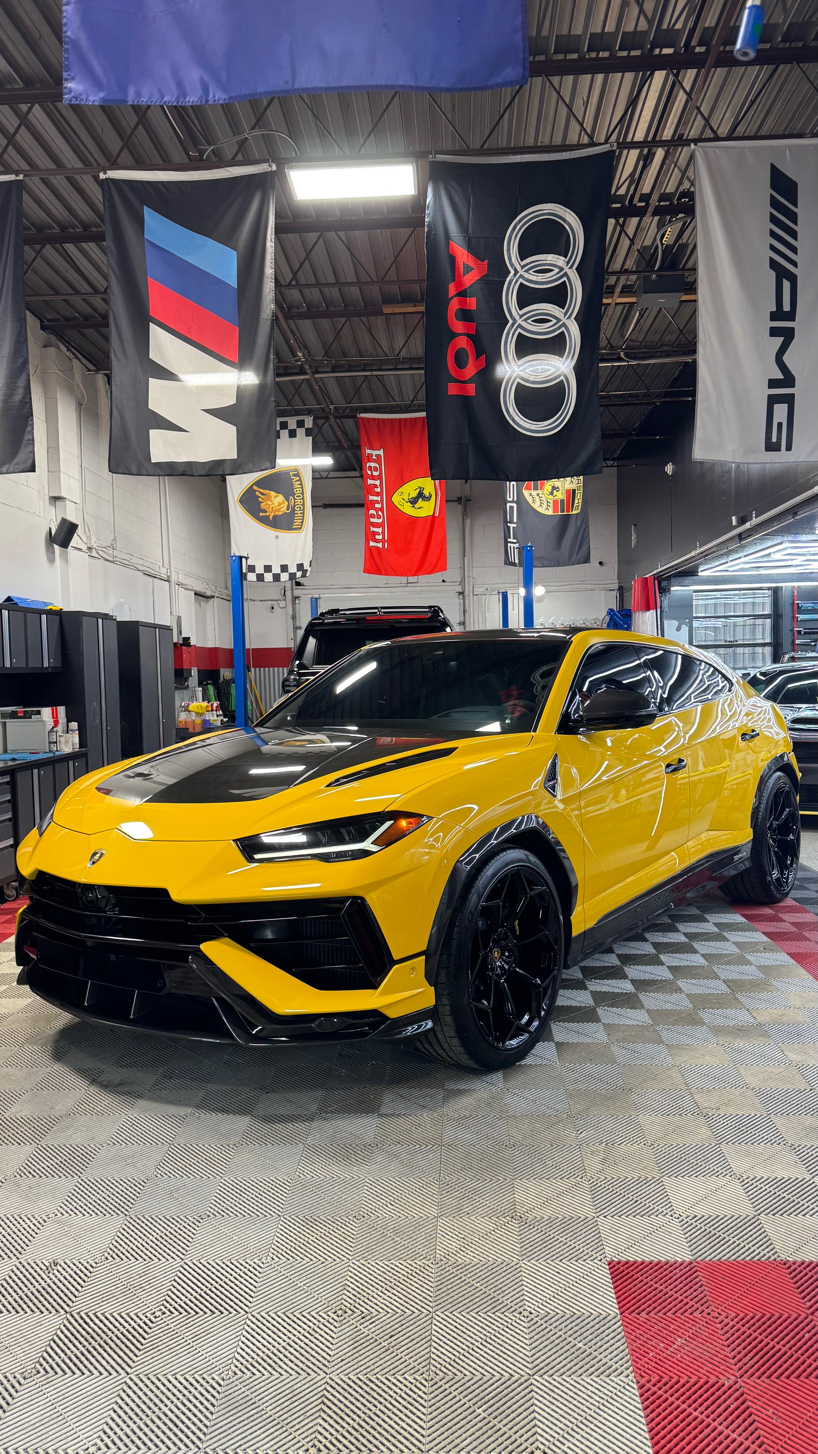 Yellow Lamborghini Urus at Detail Masters